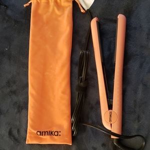 Coral never been used hair straightner